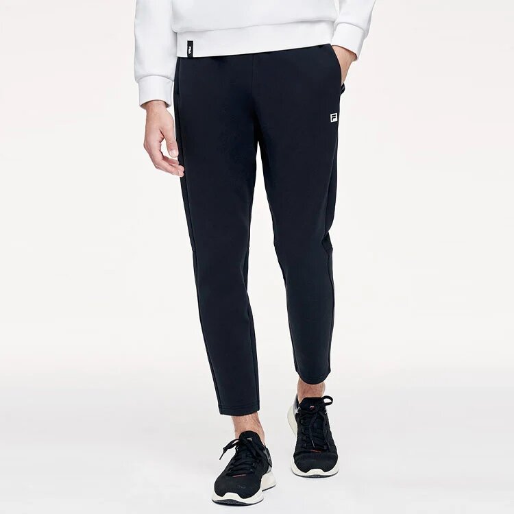 Pantalones deportivos de punto rectos de un solo color, negros