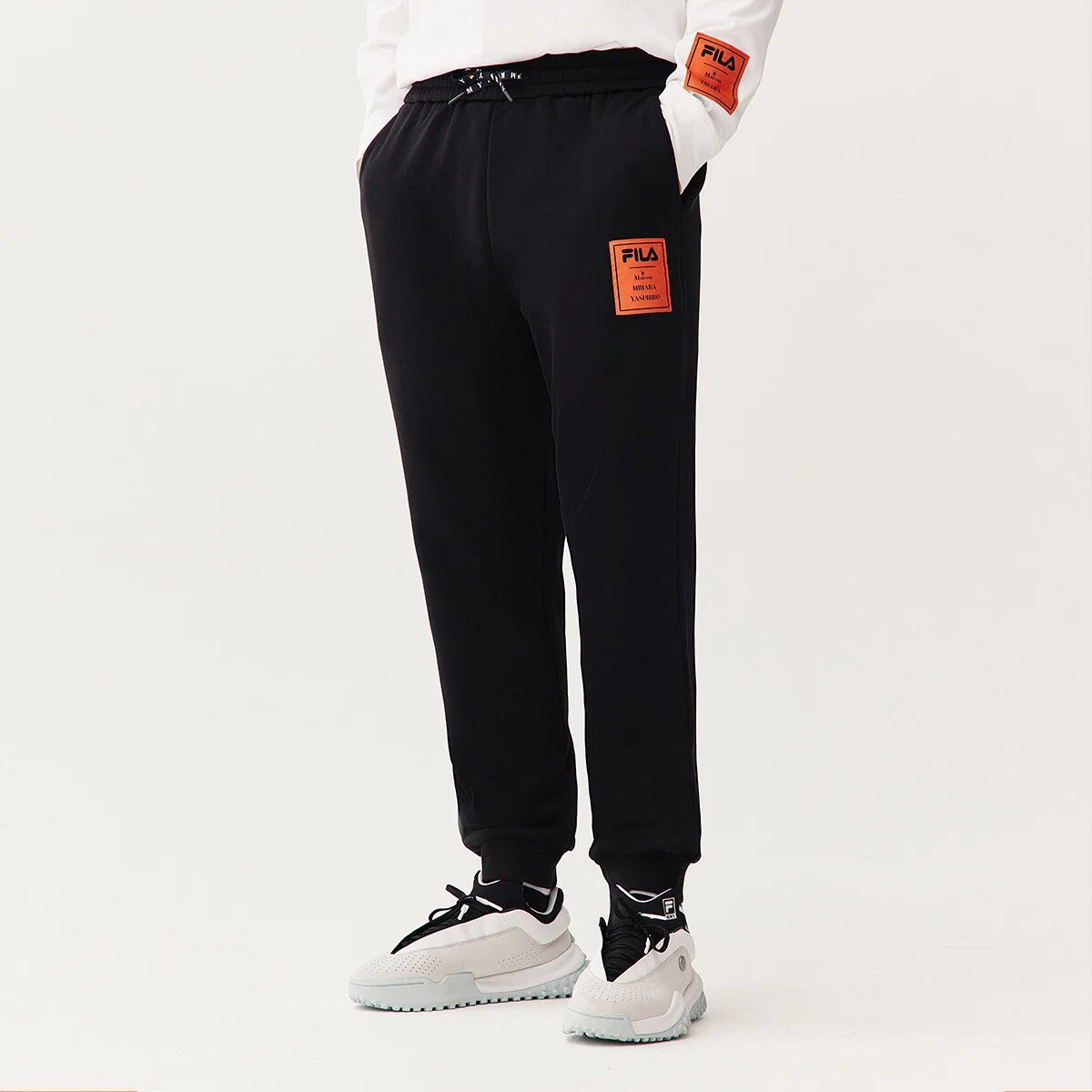 Pantalones largos deportivos de punto Fila x Mihara Crossover Casual Bundle Feet, negros