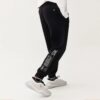 Pantalones largos deportivos de punto Fila x Mihara Crossover Casual Bundle Feet, negros